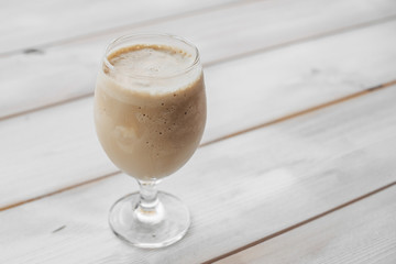 cup of Frappuccino on table