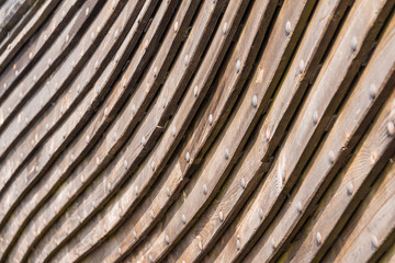 A rough wooden hull of the Viking ship closeup