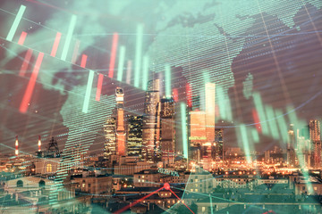 Double exposure of financial graph and world map on city veiw background. Concept of financial market research and analysis