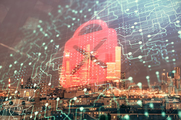 Double exposure of lock icon hologram on cityscape background. Concept of data security