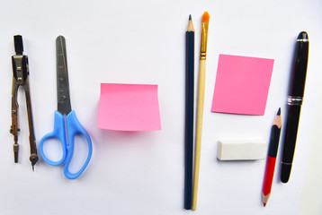 stationery on white background top view