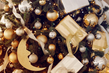 Decoration chrismas tree with white and gold balls. New year concept.