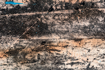 Texture of a concrete wall with cracks and scratches which can be used as a background