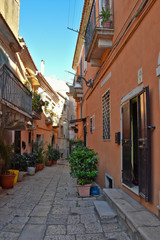 Fototapeta premium Venosa, Italy, 10/27/2019. A tourist visit in an ancient medieval town.