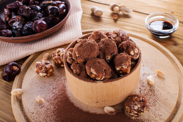 Homemade energy balls with chocolate, cream and cocoa