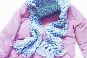 Flat lay fashion photo clothes combination. Winter clothing trends. Women's winter jacket, blue...