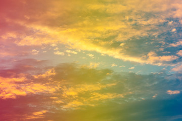 A soft fog cloug background with pastel colored orange to blue gradient