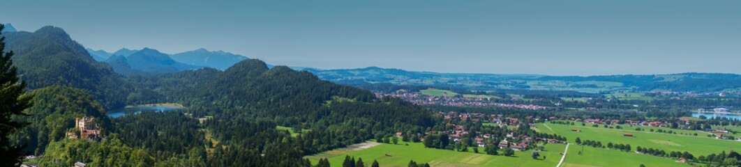 View of Bavaria countryside with rolling mountains and trees. 