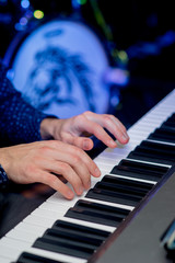 Obraz na płótnie Canvas man plays the keys. Musical concept.