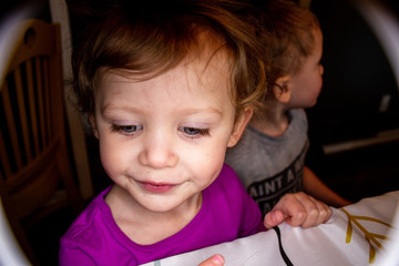 Cadence playing with some new toys