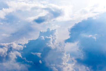 blue sky is covered by white clouds on raining day