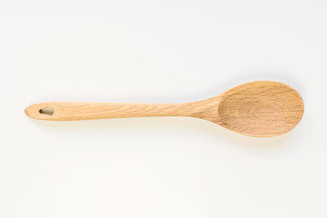 Traditional wooden spoon isolated on white background