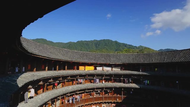 FUJIAN, CHINA – Chuxi Tulou Cluster. Tulou is the unique traditional rural dwelling of Hakka. View from inside the house (time-lapse)