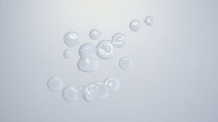 Bubbles and drops on a grey surface