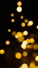 Golden christmas tree balls with candle lights