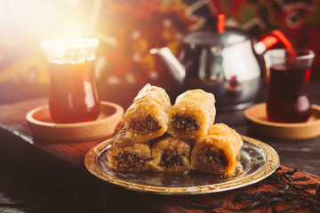 turkish tea and baklava on wooden table