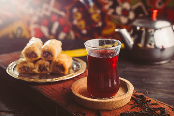 turkish tea and baklava on wooden table