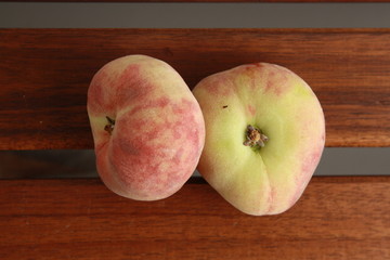 Paraguayan peach on wooden background