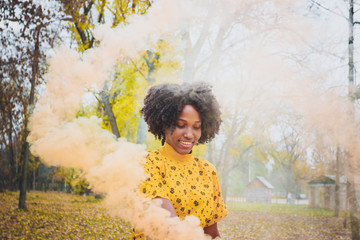 Young dark-skinned woman dressed in casual clothes