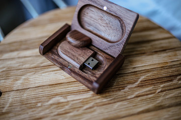 Handmade wooden flash drive in a box made of solid wood.