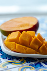 Fresh ripe mango fruit, new harvest on mangoes in Tropical Coast near Malaga, Andalusia, Spain