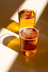 Cold amber color light spanish beer served in glass in outdoor cafe in sunny Andalusia, Spain