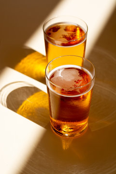 Cold amber color light spanish beer served in glass in outdoor cafe in sunny Andalusia, Spain