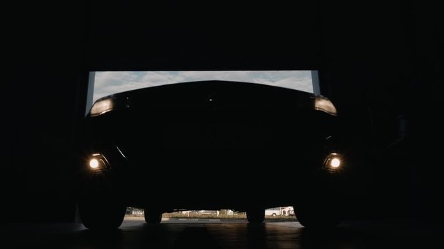 vehicle arrive service station. automobile repair bottom view. car drives into a garage for diagnosis