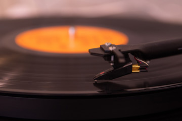 Pickup needle of a turntable on a vinyl LP 