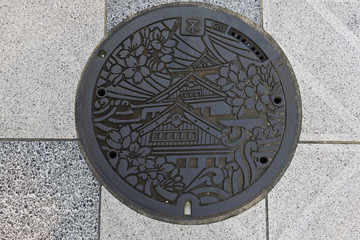 Manhole cover in Oaska, Japan