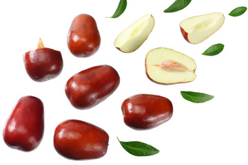 fresh date fruit with sleces and leaves isolated on white background. top view