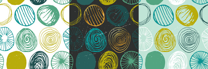 Beautiful vector set of three seamless grunge patterns in blue and green colors. Endless texture with abstract hand drawn round shapes. Repeating wallpapers. Trendy background design.