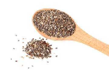 Chia seeds in wooden spoon isolated on white background. Top view.