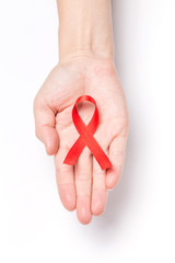 The red ribbon is an international symbol of HIV and AIDS awareness