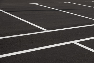 Close-up of freshly marked parking lot with white lines © Ivan Traimak