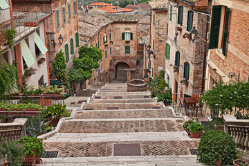 Fototapeta na wymiar Corinaldo, Ancona, Marche, Italy: the long staircase of the ancient village