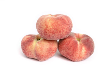 Selection of peaches shot on a white background