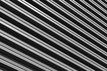 Obraz premium Gray metal sheets with screw for background, diagonal view.