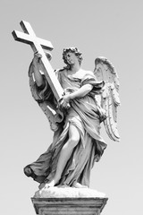 Obraz premium Bernini's sculpture along Sant'Angelo bridge before Castel S.Angelo in Rome, Italy. 