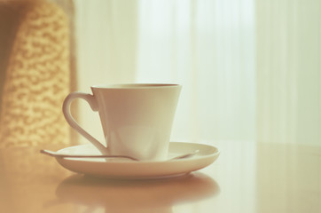 Coffee cup on wood table