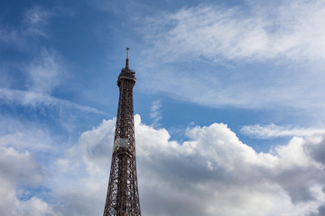 Fototapeta na wymiar Top of the Eiffel Tower in Paris France October 2019 beautiful cloudy blue skies