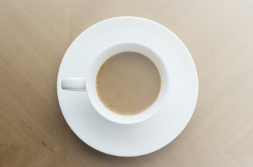 Coffee cup on wood table