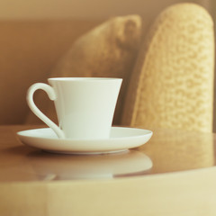Coffee cup on wood table