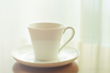 Coffee cup on wood table