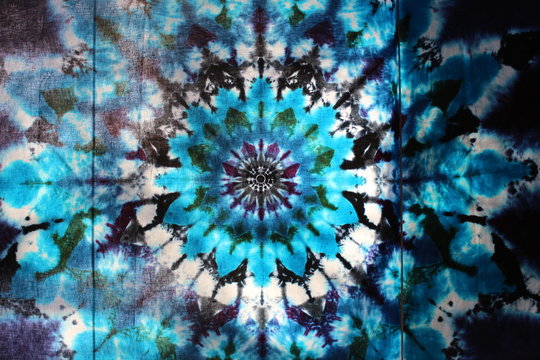 White and multicolored tie-dyed shirt