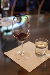 table set for wine tasting red wine in wine glass 