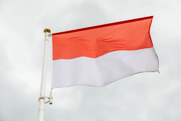 white and red flag of Kingdom Monako