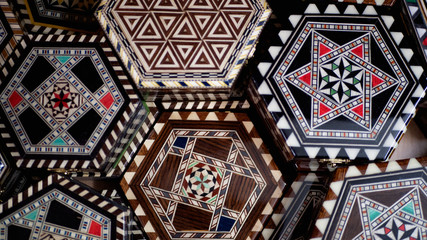 Traditional mother of pearl souvenir boxes in the market of Alhambra, Granada, Spain