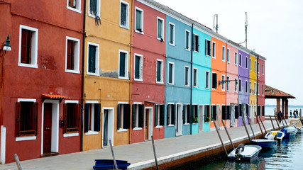 Fototapeta na wymiar Colorful and lovely houses in Burano, island next to Venice, Italy. 