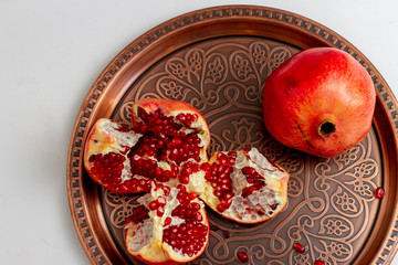 Pomegranate fruit on dish still life 